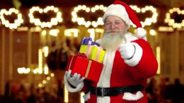 Santa başparmak gösterilmesini.