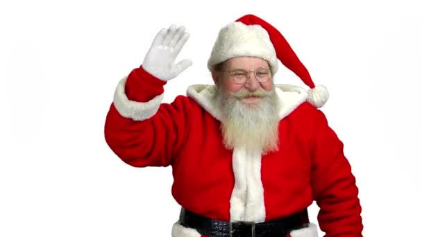 Santa viftande hand, vit bakgrund. — Stockvideo
