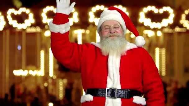 Santa Claus macha ręką. — Wideo stockowe