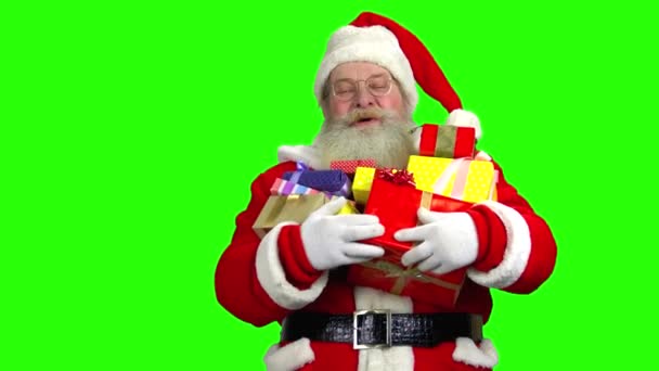 Santa segurando presentes, tela verde . — Vídeo de Stock