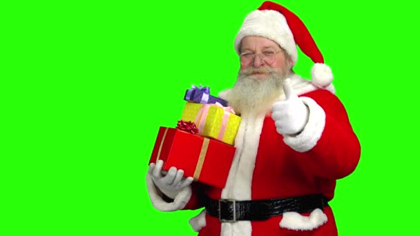 Santa na zeleném pozadí. — Stock video
