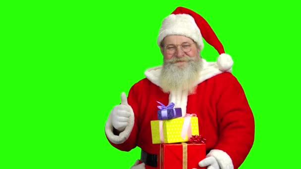Santa gospodarstwa prezenty, zielony ekran. — Wideo stockowe
