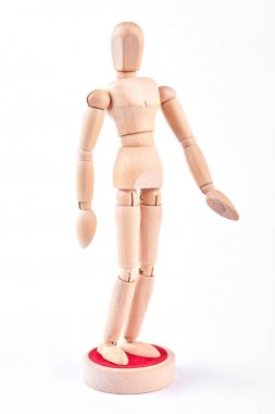 Beyaz arkaplanda tahta kukla.