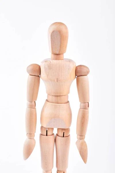 Maniquí humano de madera de pie sobre blanco . — Foto de Stock