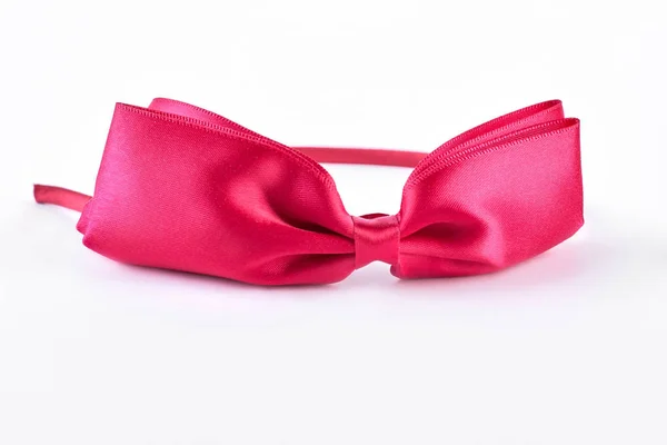 Rosa hårband med rosett. — Stockfoto
