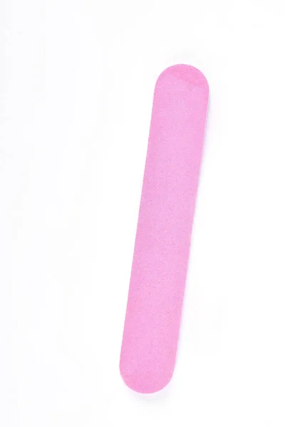 Różowy pilnik do paznokci na białym tle. — Zdjęcie stockowe