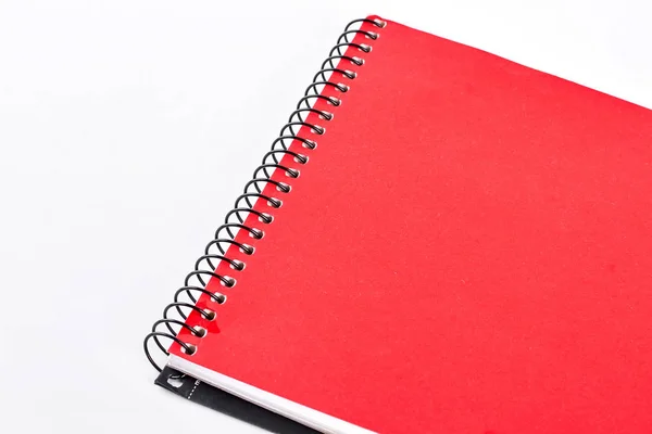 Red notepad on white background. — Stock Photo, Image