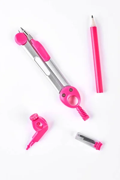 Compas de dessin rose et crayon . — Photo