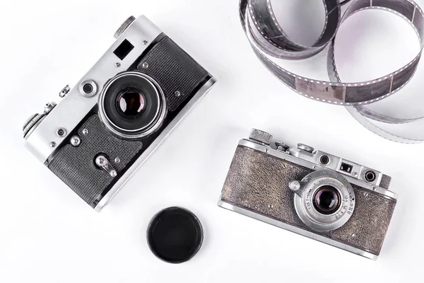 Застарілі камери на білому тлі . — стокове фото