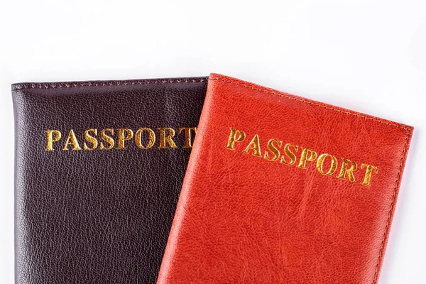 Two passports on white background.