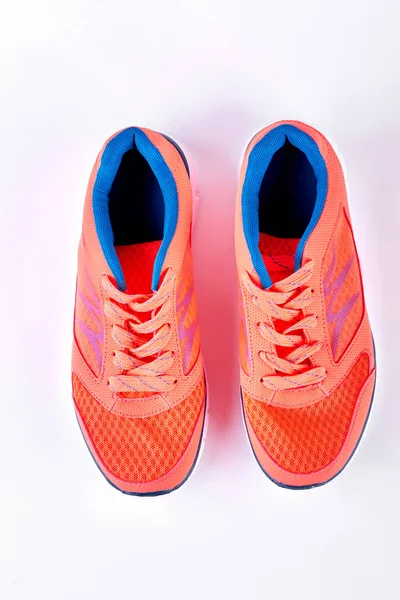 Chaussures de sport orange, vue de dessus . — Photo