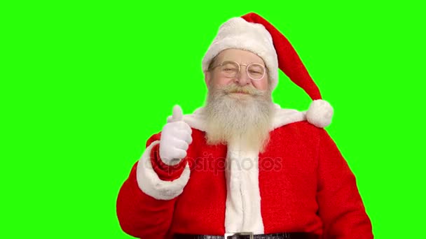 Санта-Клаус на зеленом фоне . — стоковое видео