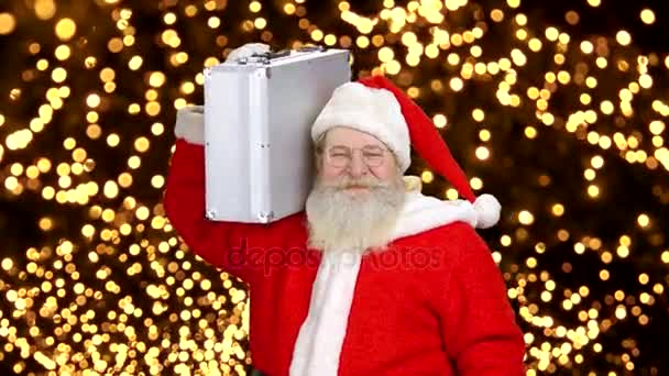 Санта-Клаус держит портфель . — стоковое видео