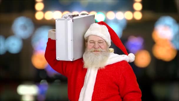 Allegro Babbo Natale che tiene la valigetta . — Video Stock