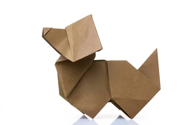 Оригами собака на белом фоне . — стоковое фото