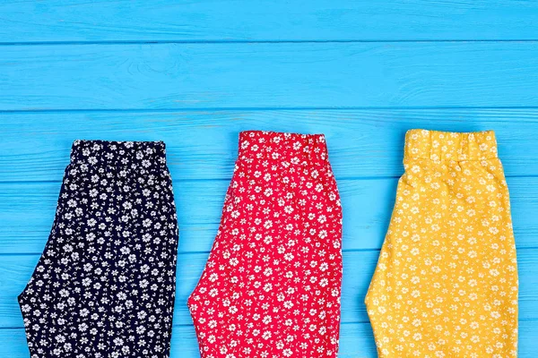 Collection of collorful trousers for children. — Stock Photo, Image