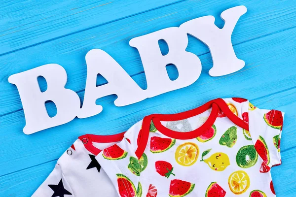 Fruit print cotton baby clothes. — Stock Photo, Image