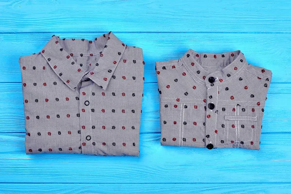 New folded shirts for little boys.