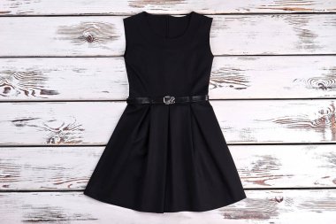 Black sleeveles short cotton dress. clipart