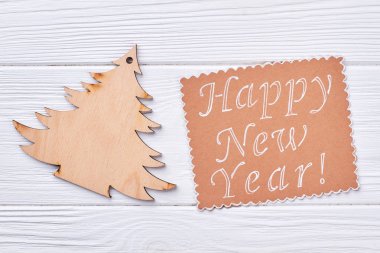 Ahşap Noel ağacı ve mesaj.