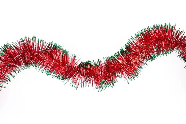 Red and green Christmas tinsel for decorations. — Stock Photo, Image