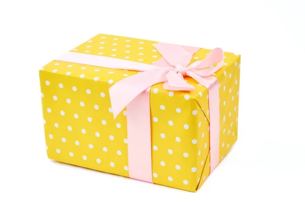 Yellow dotted gift box. — Stock Photo, Image