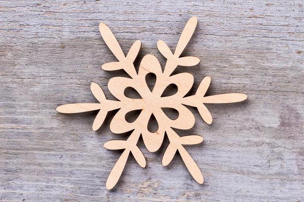 Decorazione di Natale stella fiocco di neve in legno . — Foto Stock