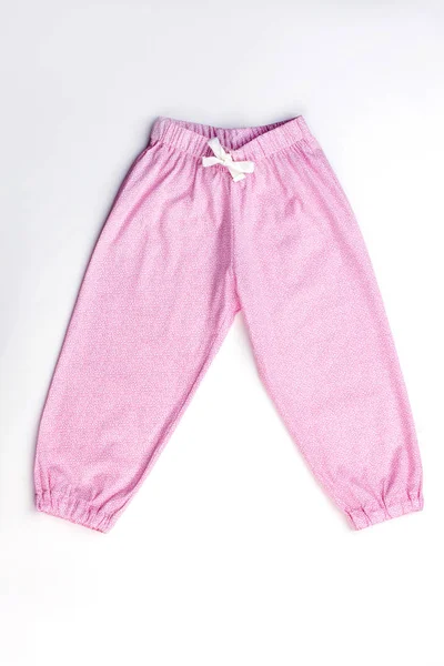 白地にピンクのパジャマ ズボン — ストック写真