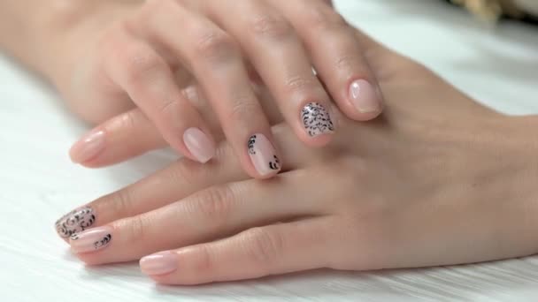 Well-groomed female hands with nude manicure. — Stock Video