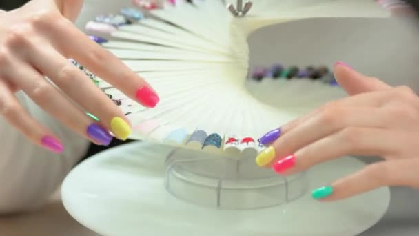Multicolored manicure and nail samples. — Stock Video