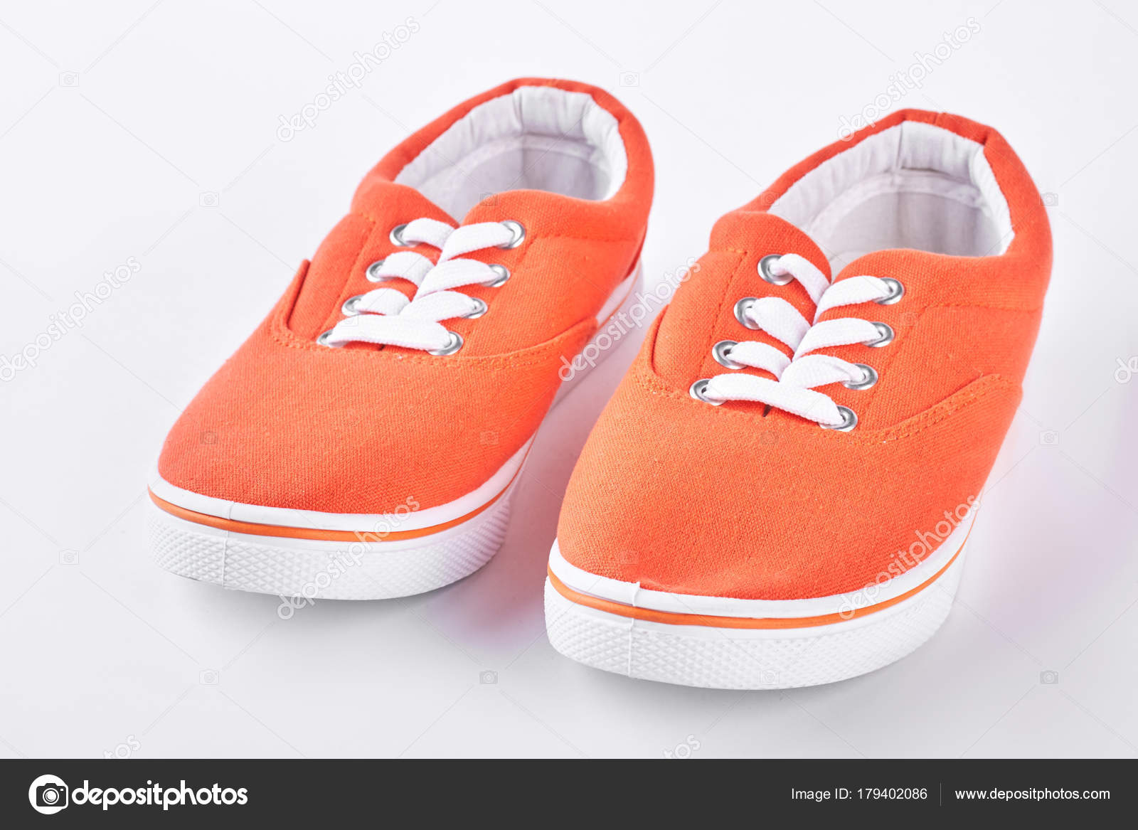 orange and white vans shoes