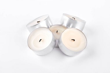 Wax candles on white background. clipart