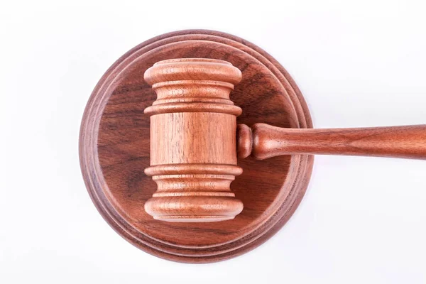 Wooden gavel on wooden stand. — Stock Photo, Image