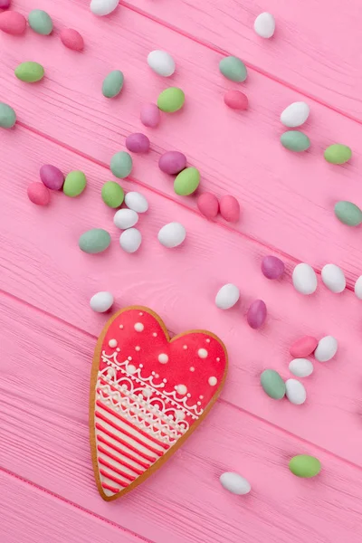 Composition with candies and cookie. — Stock Photo, Image