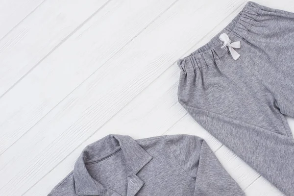 Gray pajama set on white