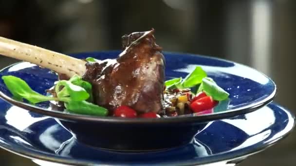 Lamb knuckle and vegetables. — Stock Video