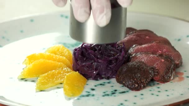 Duck breast, cabbage and orange. — Stock Video