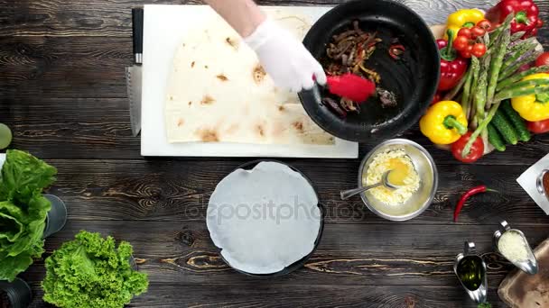 Food preparation, burrito. — Stock Video