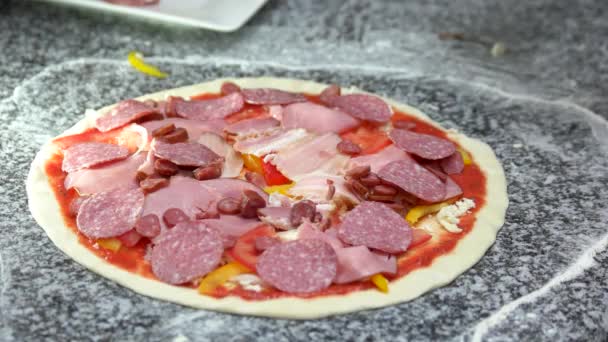Chef making pizza, salami. — Stock Video