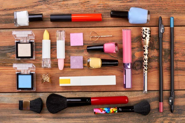Set of decorative cosmetics and tools.