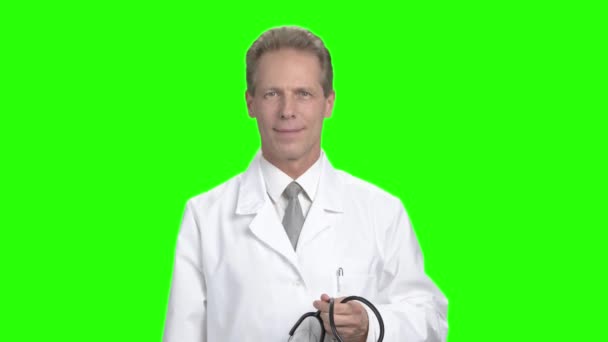 Красивий лікар, що показує знак ОК . — стокове відео