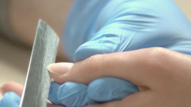 Dosyalama, ağır çekim tırnak kapat.