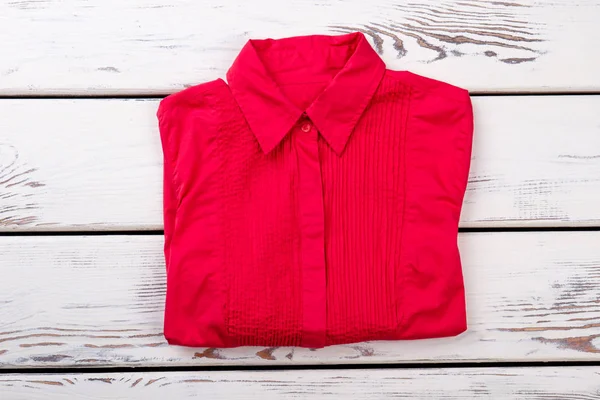 Red folded shirt. — Stock Photo, Image