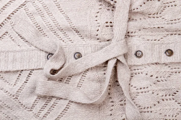 Tekstura beżowy ubrania wełniane. — Zdjęcie stockowe
