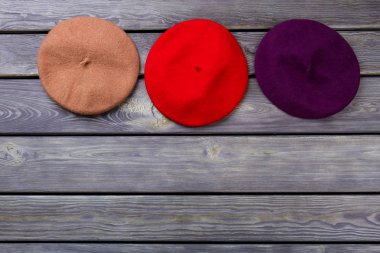 Row of colourful berete hats. clipart
