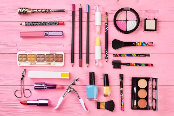 Glamour cosmetics set on pink background. — Stock Photo, Image