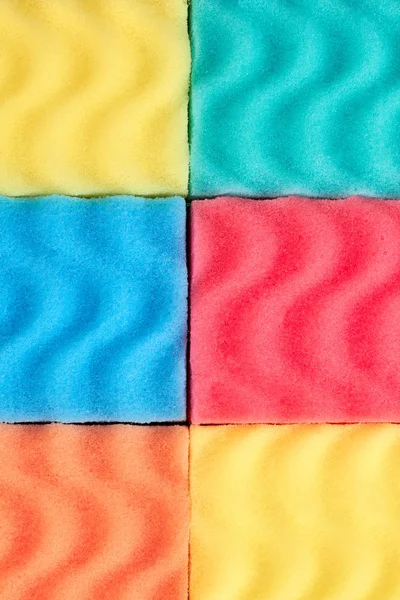 Multicolor cozinha esponjas fundo . — Fotografia de Stock