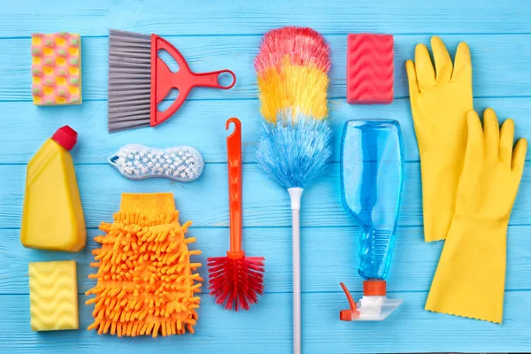 Cleaning stuff on blue wooden background. — Stock Photo, Image