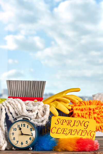 House cleaning supplies on sky background.