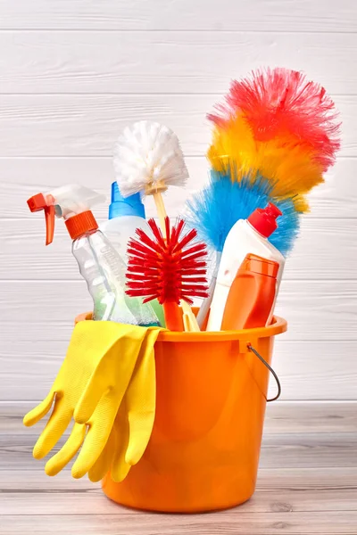 Set of cleaning supplies in colorful bucket. — Stock Photo, Image